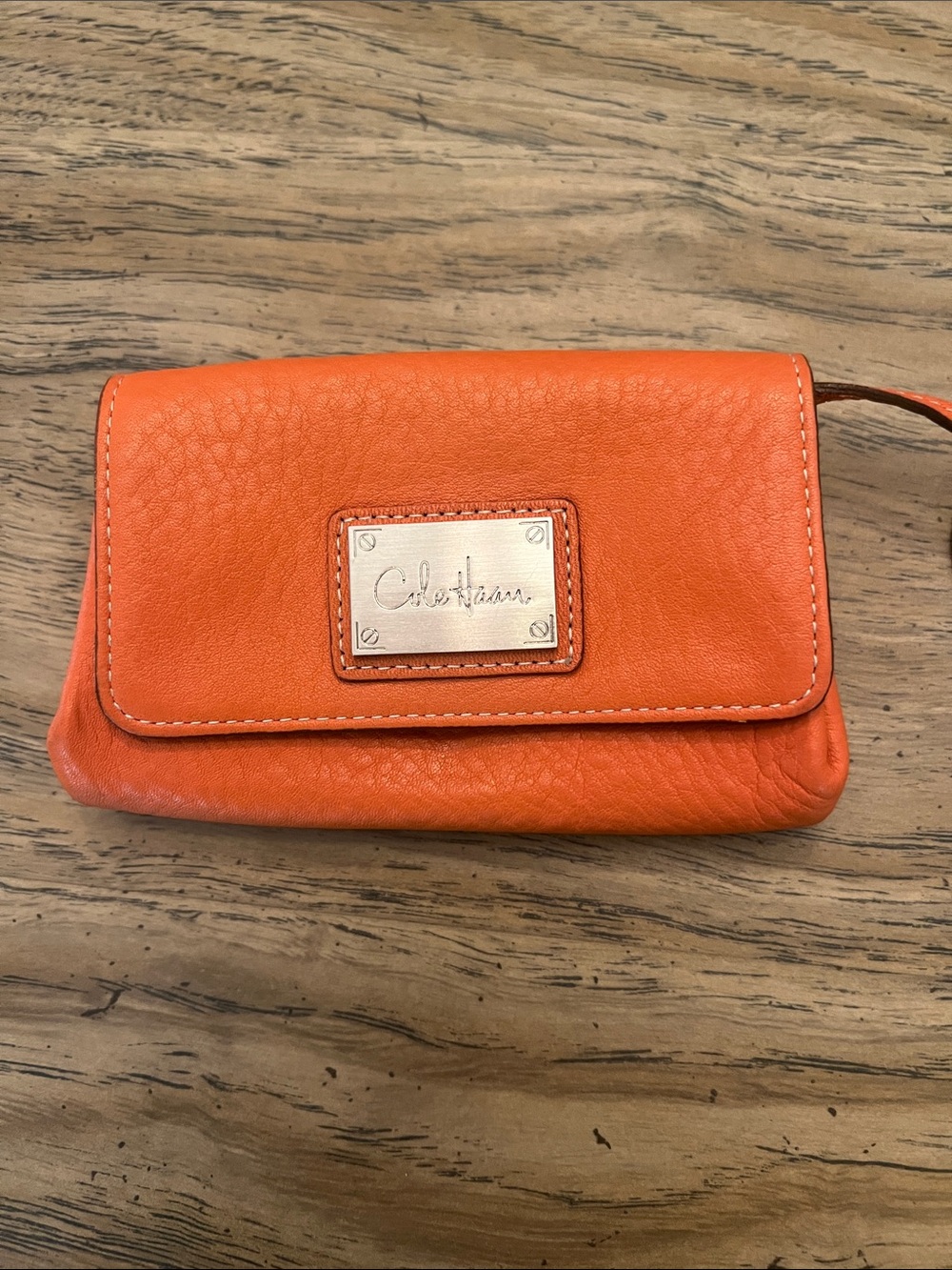 Cole Haan Bright Orange Leather Wallet with Metal Logo